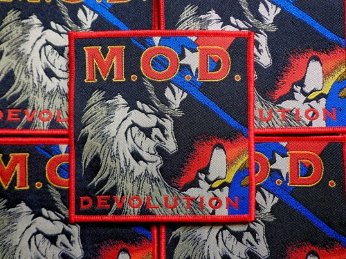 M.O.D. - DEVOLUTION [red border] --- patch.JPG