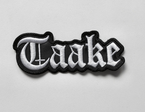 TAAKE - Logo Shaped -- Embroidered Patch.JPG