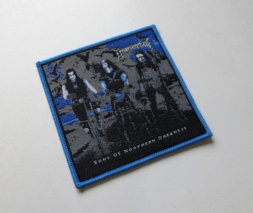 IMMORTAL - Sons Of Northern Darkness [blue outline] -- Woven Patch.JPG