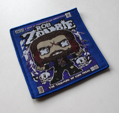 ROB ZOMBIE - The Triumph Of King Freak[blue].png